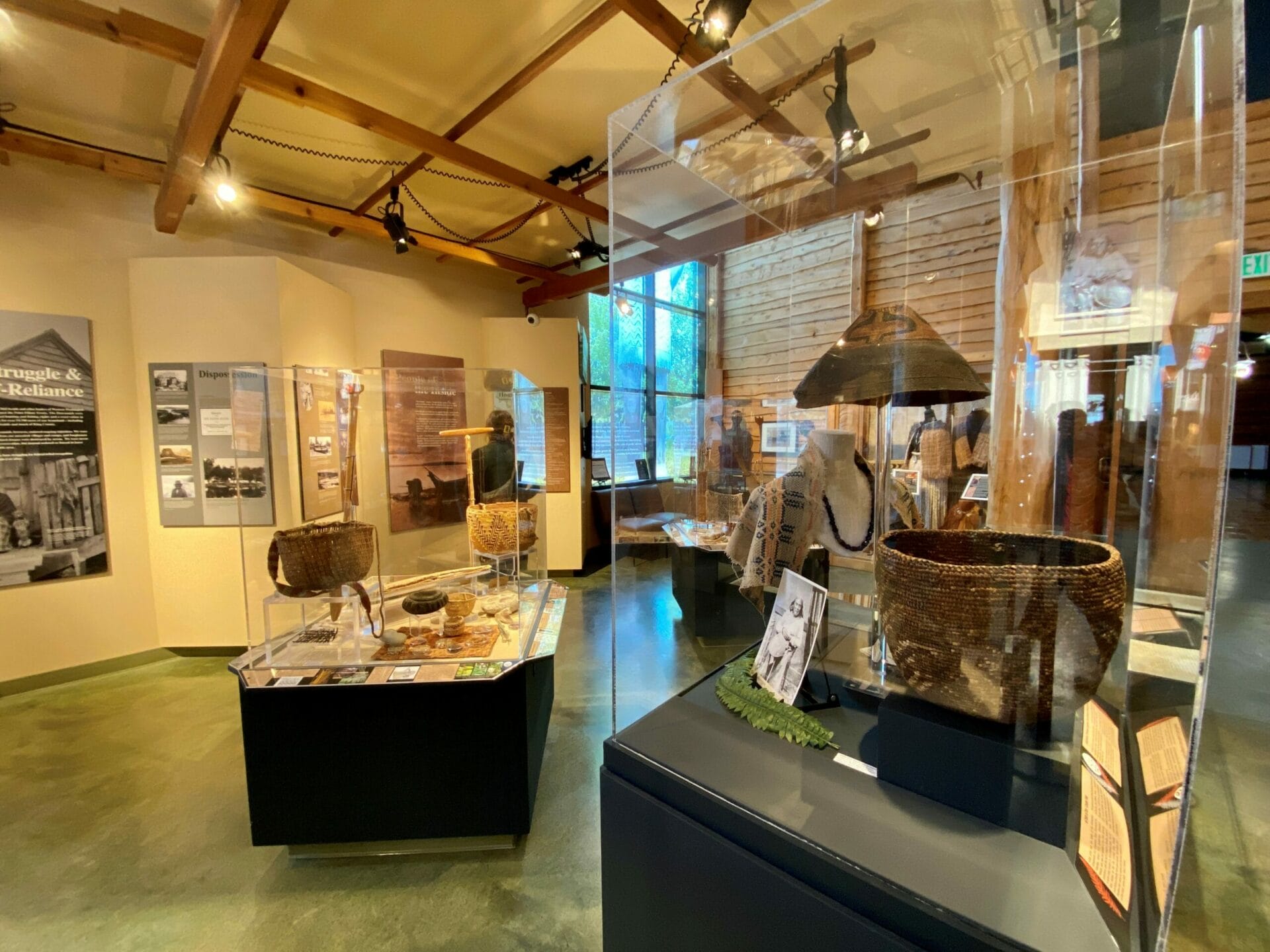 Photo of a Tribal heritage exhibit and artifacts in a museum space